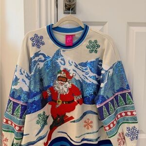 QUEEN OF SPARKLES Santa Skiing Sweater - Blue, Red, and White